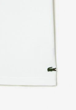 Lacoste Polo - Blanc -Tenues Mode Boutique 0af6b0b9e00544628b70ed0efde16c81