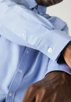 Lacoste Manches Longues - Chemise - Bleu -Tenues Mode Boutique 371d3e7abf3f4497903a3409668aba01