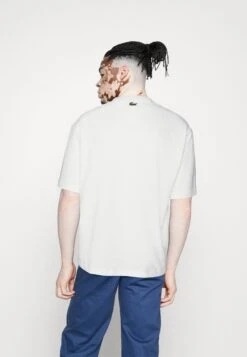 Lacoste T-Shirt Imprimé - Flour -Tenues Mode Boutique 64e10f548d31456ba1b0f758b58c4b58