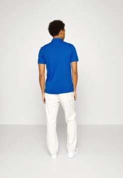 Lacoste Polo - Kingdom -Tenues Mode Boutique 82f5d67b7b1a40f4ae0aee2158cba769