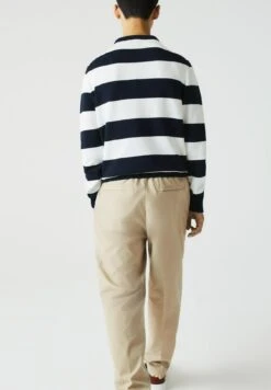 Lacoste Pantalon Classique - Beige -Tenues Mode Boutique 86e79ad074654927a7fcc7cbf01c02a0