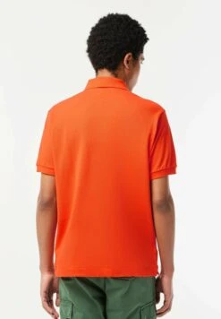 Lacoste Polo - Orange Sji -Tenues Mode Boutique b0e768a0f1d4487ab71d9ee806503a7c
