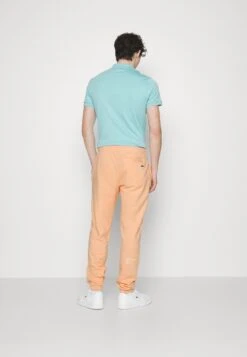 Lacoste Pantalon De Survêtement - Orange Clair -Tenues Mode Boutique ea57b1b5c0fe47eb81dc112a101db41e